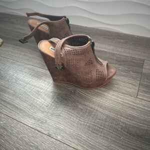 Size 8 taupe wedges. Worn twice. No visible scuffs or marks on the shoe.